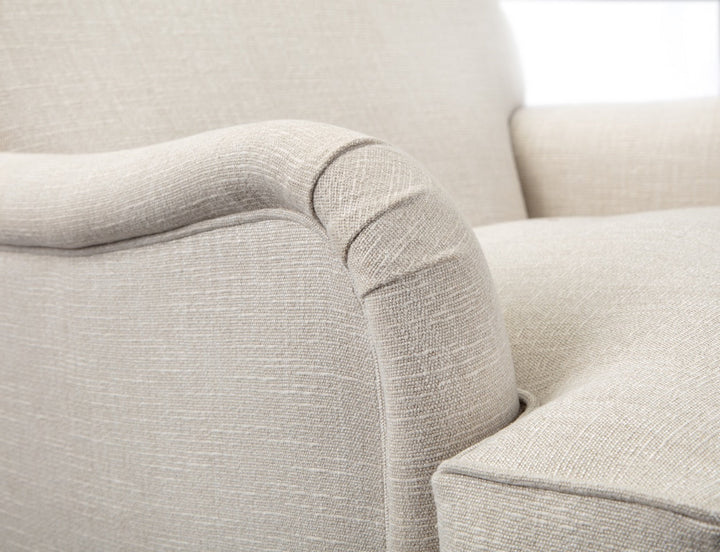 Indulge in the timeless elegance of a Howard style sofa
