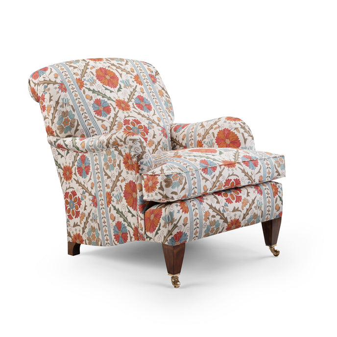 Classic Ladies Howard armchair upholstered in floral patterned fabric