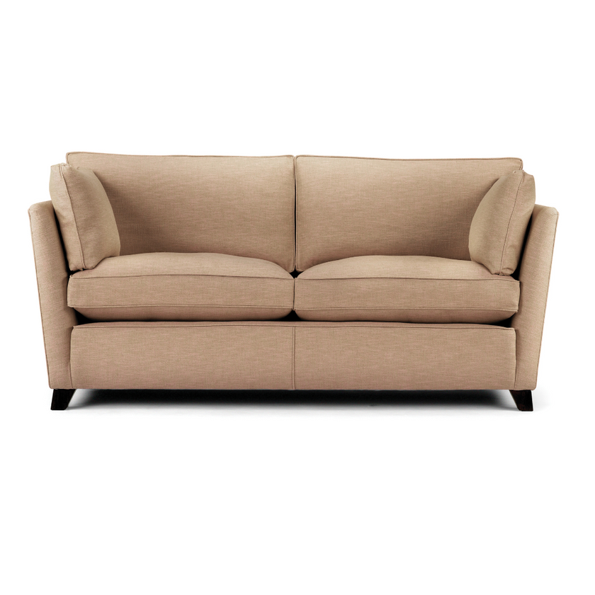 Oxford Sofa upholstered in beige fabric with angular arms and dark wooden legs
