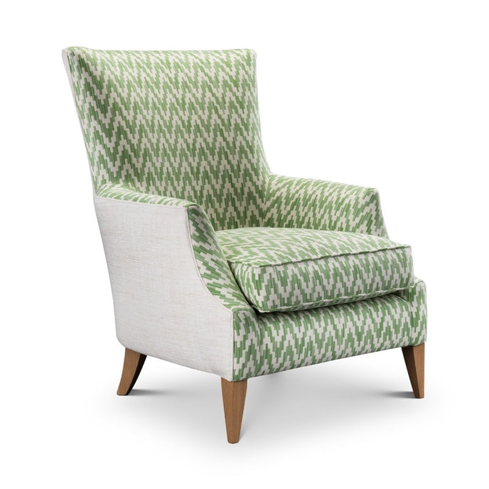 Rio Chair upholstered in green geometric fabric with tapered wooden legs